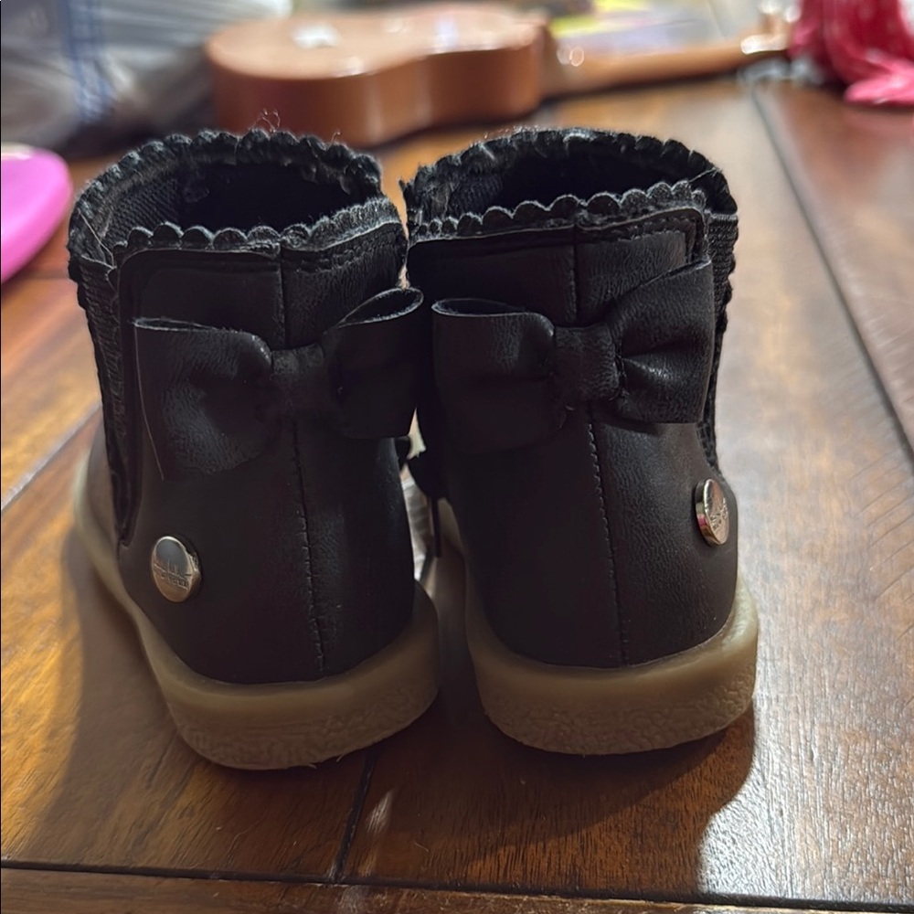 Black Ankle Boots with Scalloped Trim and Tan Soles
